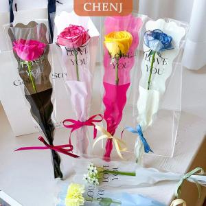 [COD] CHENJ 10ชิ้นถุงห่อดอกไม้แขนกุหลาบเดี่ยวถุงบรรจุภัณฑ์ช่อดอกไม้กระดาษแก้วใสห่อดอกไม้สำหรับวันวาเลนไทน์