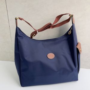 100% แท้ Official Store ของแท้ ขาตั้งกล้องสี Bean Series กระเป๋ากระเป๋าไนล่อนสะพายไหล่ผู้หญิงขนาด33*27*13 00% ต้นฉบับ