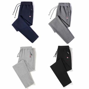 ใหม่เยาวชนกระเป๋าซิปกีฬากางเกงลำลองผู้ชายขนาดบวกหลวมถักกางเกงขาตรง