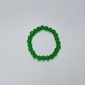 A set of three jewelry pieces featuring gemstones: a green emerald necklace and bracelet in the Brazilian style.