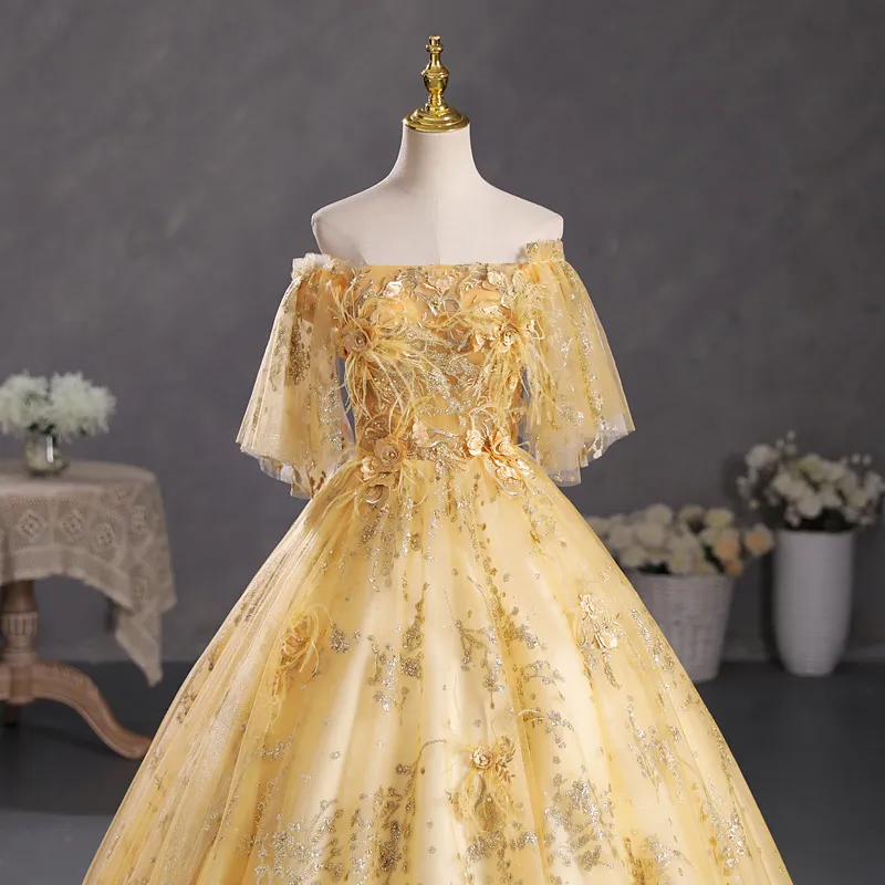 Gold off the shoulder ball gown sale