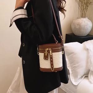 Túi xách nhỏ nữ phong cách retro 2026 Túi xô đeo chéo/xách tay họa tiết trám chất liệu cao cấp phong cách thời trang mới sang trọng nhẹ nhàng độc đáo.