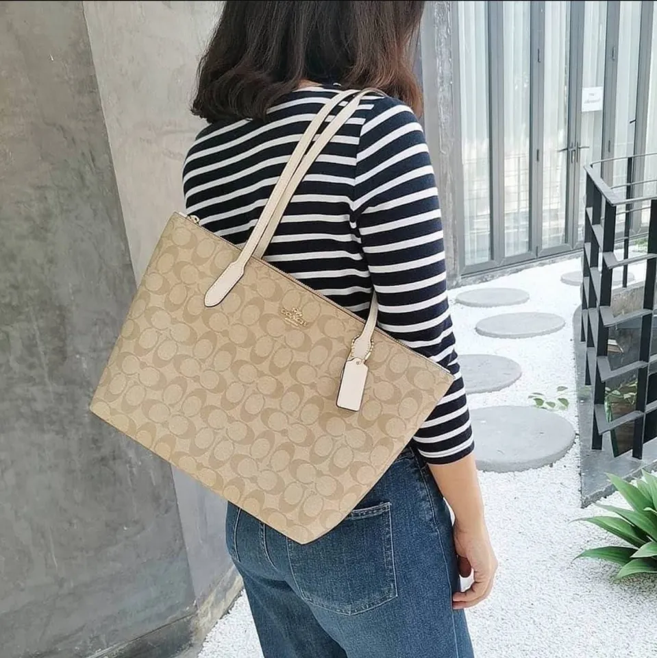 Coach zip top cheap tote in signature canvas