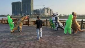 ชุดเป่าลม Tyrannosaurus Rex อุปกรณ์ประกอบฉากแต่งหน้าฮาโลวีน cosplay เสื้อผ้าอเมซอนผู้ใหญ่ไดโนเสาร์พอง #988