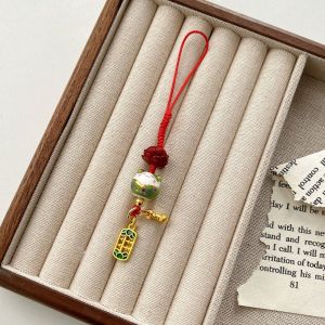 XINSU38 สายคล้องโทรศัพท์ พวงกุญแจ maneki Neko การ์ตูนลายการ์ตูน เซรามิกส์ สายคล้องโทรศัพท์แมวนำโชค ไม่ซ้ำใคร เครื่องประดับสำหรับตกแต่ง จี้โทรศัพท์มือถือแมวนำโชค สำหรับเด็กๆ