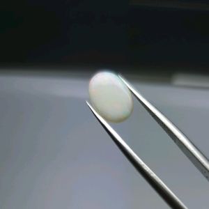 0165-ĐÁ OPAL TRẮNG( THIÊN NHIÊN) hàng úc ít thây đổi trạng thái theo thời tiết