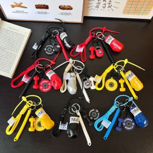 THANKSKY ขนาดเล็ก พวงกุญแจถุงมือชกมวย สายรัดปรับได้ กาต้มน้ำ พวงกุญแจถุงมือ MMA ดี ชาร์มกระเป๋า จี้แผ่นบาร์เบล ฟิตเนสโปรเพิล