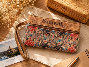 Sarawak patterned wristlet pouches with zipper closure and wrist strap.