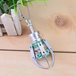 อีโอที สร้างสรรค์กดประเภทจับตุ๊กตากรงเล็บรุ่นพวงกุญแจมินิจําลองเครื่องกรงเล็บหดพวงกุญแจกระเป๋าเป้สะพายหลังจี้ ของเล่นตลกๆส่งของขวัญให้เพื่อนๆ