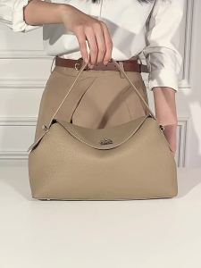Túi xách da bò cỡ lớn đa năng đeo vai đeo chéo dung tích lớn phong cách độc đáo dành cho nữ công sở mang lại vẻ sang trọng da thật có thể xách tay.