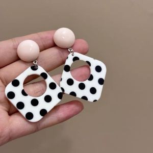 good 999 Fashionable black and white polka dot hollow rounded geometric temperament earrings ES63796