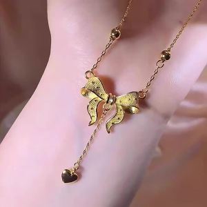 Hot-Selling Princess Gold Bow Necklace for Women Long Sweater Chain Heart Pendant Tassel Collarbone Chain