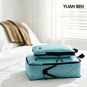 Yuanben Water‑Resistant Travel Compression Bag made of tent‑grade silicon‑coated nylon fabric  Features wide opening for easy access and reinforced strap design to save storage space while travelling