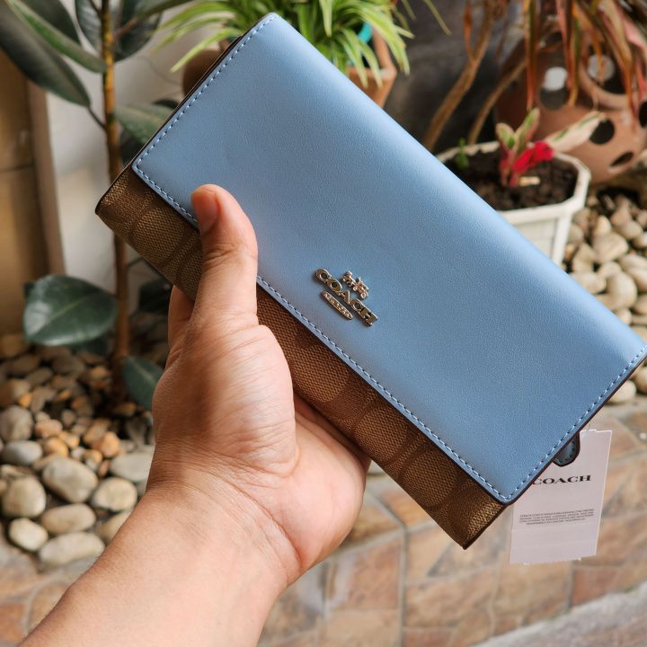 women blue coach wallet