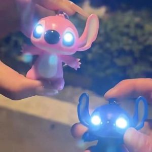 Disney Anime Stitch Dolls LED Keychain Flashlight with Sound Cartoon Model Key Ring Fashion Couple Bag Ornament Key Chain Car Pendant Gift