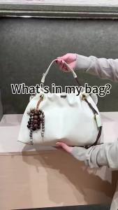 Song Soft Cowhide Garbage Bag Tote Bag Casual style drawstring closure large-capacity adjustable shoulder strap single-shoulder crossbody commuter bag with a relaxed vibe #71206