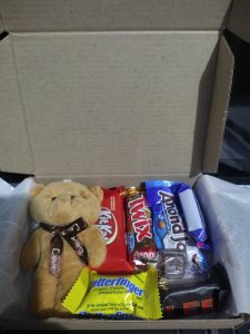 gift box of chocolate with free teddy and message.