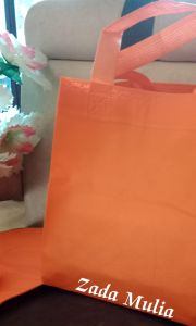 Tas Parcel Lebaran Idul Fitri  Haji Umroh Tebal 12 pcs Uk. 25x35 cm Goodie Bag Kain Spunbond Press