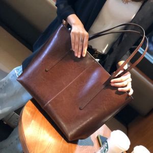 Túi xách nữ da bò phong cách retro mẫu mới túi tote dung tích lớn da thật dễ phối đồ túi đeo vai công sở.