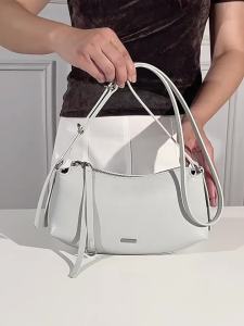 Womens handbag made of genuine leather casual style with a zipper adjustable and detachable shoulder strap can be used as a shoulder bag or crossbody bag medium size for daily use and work travel.