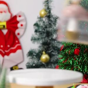 Christmas decorations including artificial Christmas tree ornaments mushroom-shaped hanging decorations Santa Claus figurines and hanging ornaments for scene setting