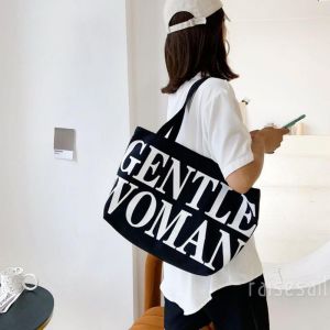 Túi xách nữ vải canvas cao cấp in chữ WOMAN có khóa kéo thích hợp đi học đi chơi phong cách Hàn Quốc Trùm Sỉ Gia Thành