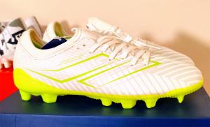 Mills Xyclops Helios FG Jr - junior football boots specifically designed as a slip-on laceless model