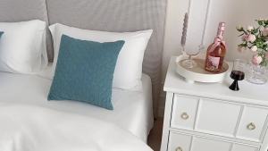 Decorative Bed Runner hotel-style use stated in source adds a decorative textile layer across the foot of a bed for hotel guest room or home bedroom organised storage bed runner