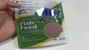 Thức ăn cho cá bảy màu các loại cá thuỷ sinh cá biển gói 100g Dr+ Premium Cichild Chips