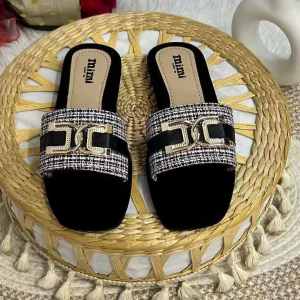 Womens Slide Sandals with Decorative Straps in Black Gold and Brown Colors.