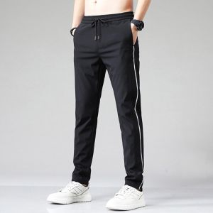 Quần dài thể thao nam phối 1 sọc nhỏ thời trang năng động mùa xuân hè 2026