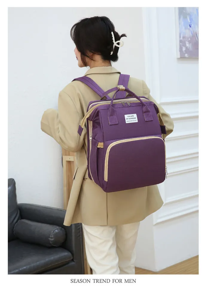 in Diaper Bag Backpack with Changing StationTravel Bassinet