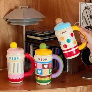 PUDE 316 สแตนเลส ถ้วยสุญญากาศ พร้อมที่จับ ฝาปิดหลอด ถ้วยเก็บความร้อน ฤดูหนาว 600มล. แก้วดื่มโดยตรง สำหรับนักเรียน