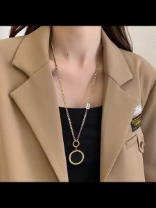 AE Titanium steel with gold plating B Black and white mother-of-pearl sweater chain long Roman numeral round pendant necklace womens light luxury simple accessory
