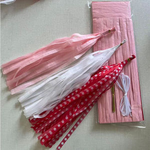 Strawberry-themed party decorations: string lights tassel curtains backdrop wall birthday party setup hanging paper tassels