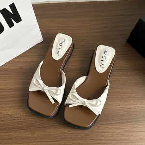 รองเท้าแตะปมผู้หญิงผีเสื้อฝรั่งเศสฤดูร้อนสไตล์นางฟ้าแฟชั่นหัวเหลี่ยมกับกระโปรงชายหาดที่สวยงามลาดส้นรองเท้าแตะคำเดียว