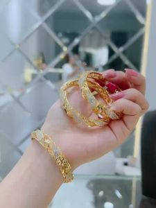 {loại 1} Vòng tay xoắn đính đá cz nhân tạo khoá bấm mạ vàng Kami trang sức sỉ VXD95