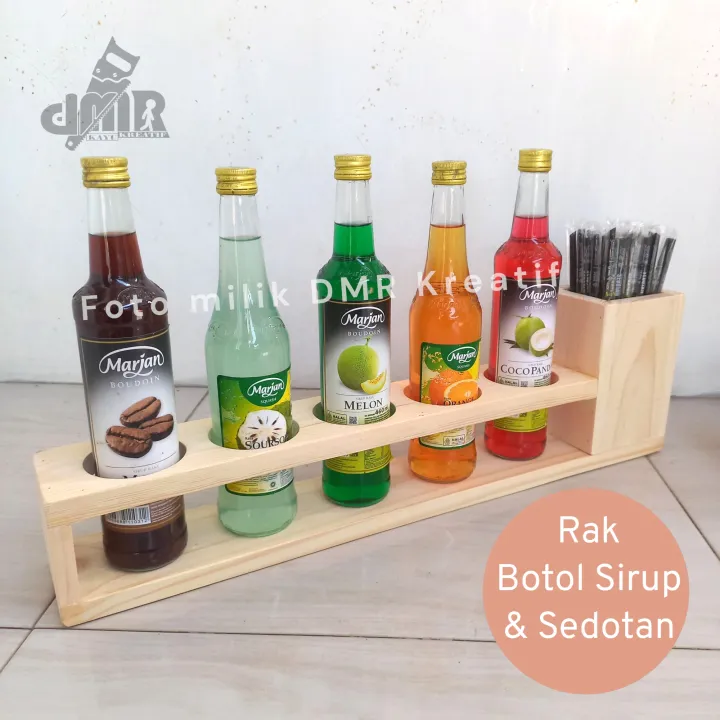 Rak%20Tempat%20Botol%20Sirup%20Kayu%20Kecap%20Minyak%20Saos%20Bumbu%20Plus%20Sendok%20Sedotan%20Es%20Teh%20Juice%20Lubang%207%20Cm%20-%20Image%202