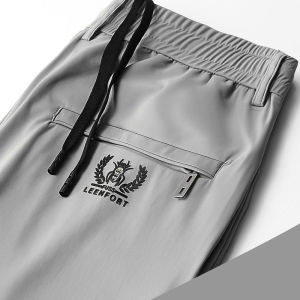 Mens summer ultrathin section casual pants breathable stretch loose straight quick dry pants