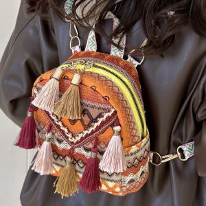 กระเป๋าเป้สะพายหลังเก๋โบโฮปักลายกระเป๋าสะพายพาดลำตัวผ้าใบชนเผ่าจีนพร้อมพู่สำหรับผู้หญิงแฟชั่น2026