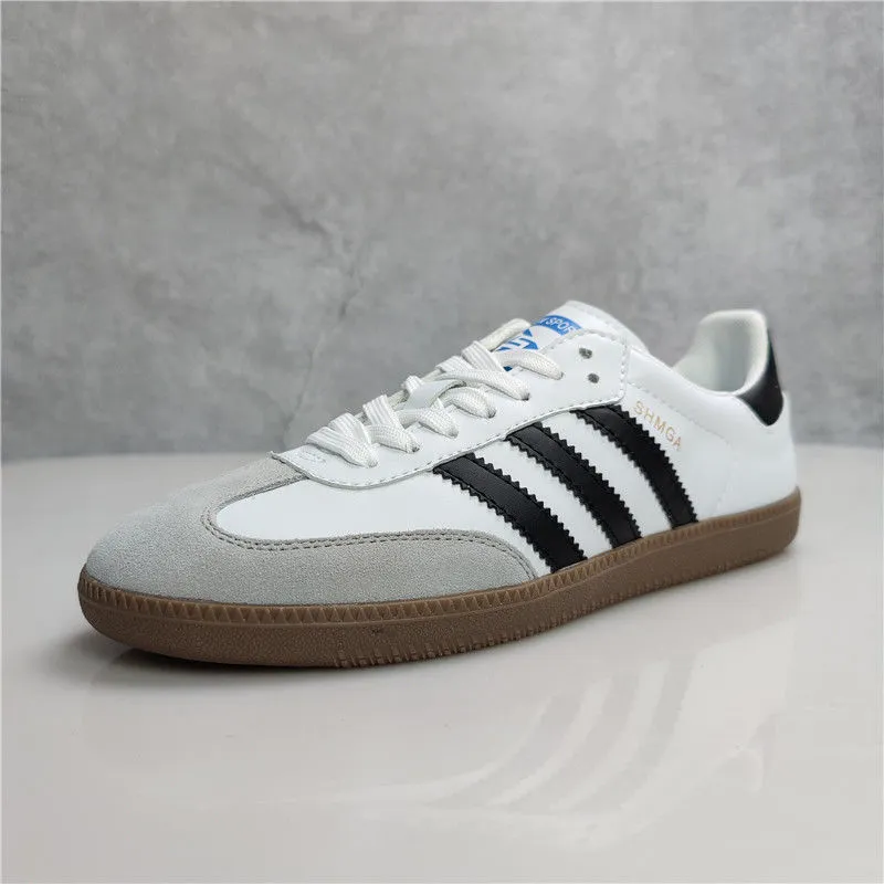 White shoes with hot sale three black stripes