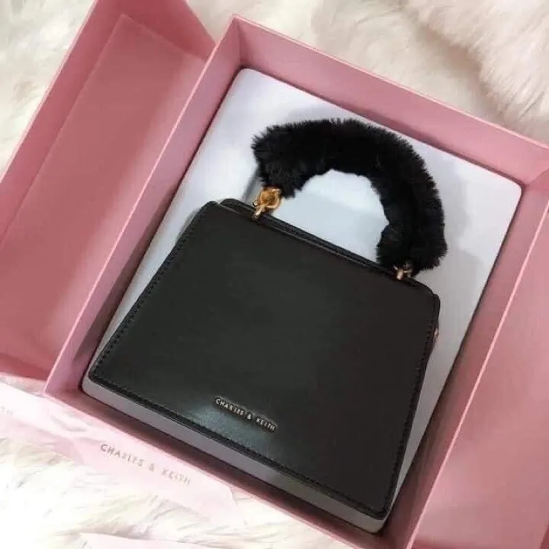 Charles and keith pink 2025 fur bag original price