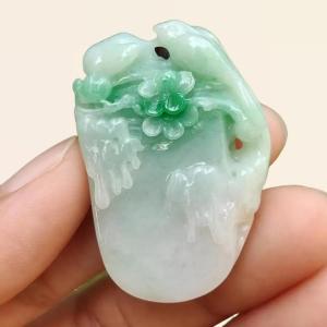 Beautifully crafted with birds and flower light green Natural Type A Jadeite Jade as Pendant certificate weighs 18.63 grams measurement 38.3 * 25.9 * 9.6 (pendant247)