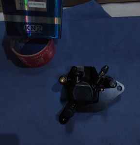 KALIPER KEPALA BABI DEPAN ABSOLUTE REVO BLADE MERK KNZ