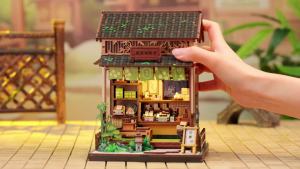 CUTEBEE DIY Book Nook Kit Miniature Model Wooden Dollhouse with LED Light Bookshelf Insert Fruit Shop for Bookstore Decoration