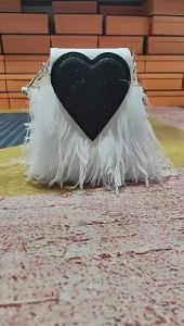 2025 Shiling fashion brand womens bags heart-shaped bags feather bags ostrich feather bags hand-held and crossbody phone bags