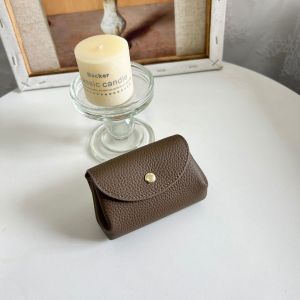 Ví nhỏ cho phụ nữ da thật phong cách Nhật Bản 2025 Ví đựng tiền xu mới cho phụ nữ túi tiền xu mini phong cách ngắn bán buôn