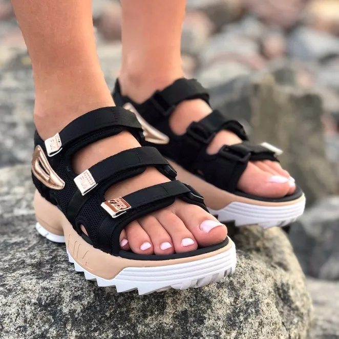 Fila sandals clearance black and gold