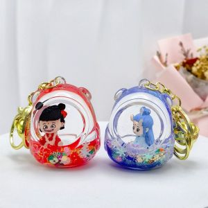 BEAUTYLADIES อะคริลิค จี้ทรายดูด Nezha กระดิ่งเล็กๆ โปร่งใสโปร่งใส พวงกุญแจรถกุญแจ สร้างสรรค์และสร้างสรรค์ สปาร์กลิง พวงกุญแจตุ๊กตา Nezha ของขวัญของเล่นเด็ก