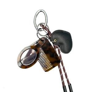 Sturdy Plastic Alloy Rope Keychain With Builts In Comb Mirror for Portable Storage and Personalize Care Daily Use